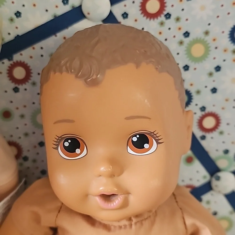 2 cute soft body dolls blonde hair and dark